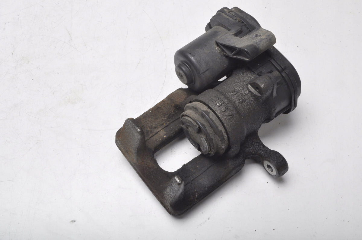 AUDI Q3 AND BRAKE CALIPER LEFT REAR