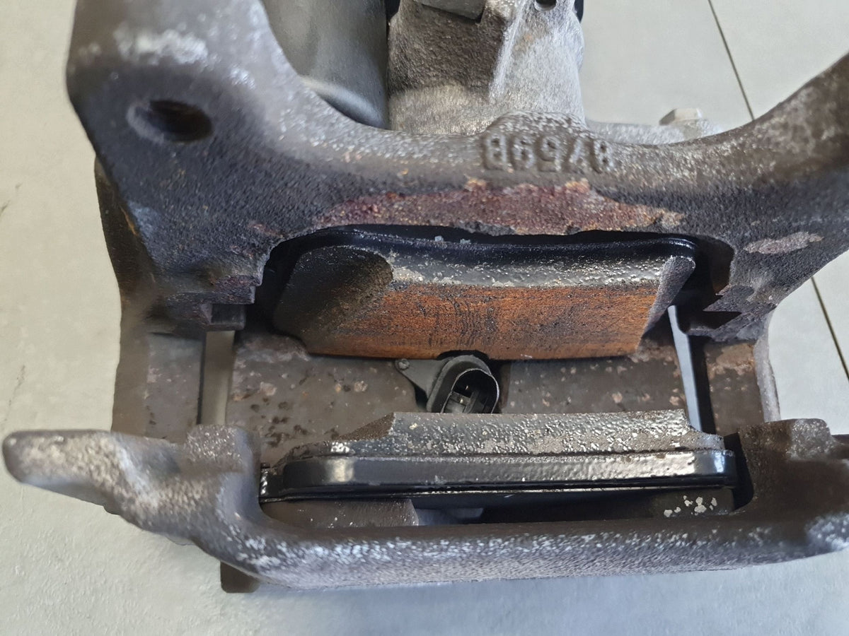 Audi Q7 4M Brake caliper left rear 4M0615405AR