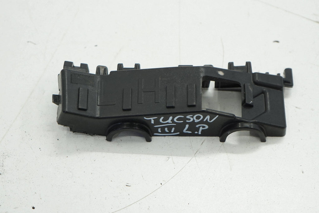 HYUNDAI TUCSON III 17R SLIDE BUMPER MOUNT LEFT FRONT 86515D7000