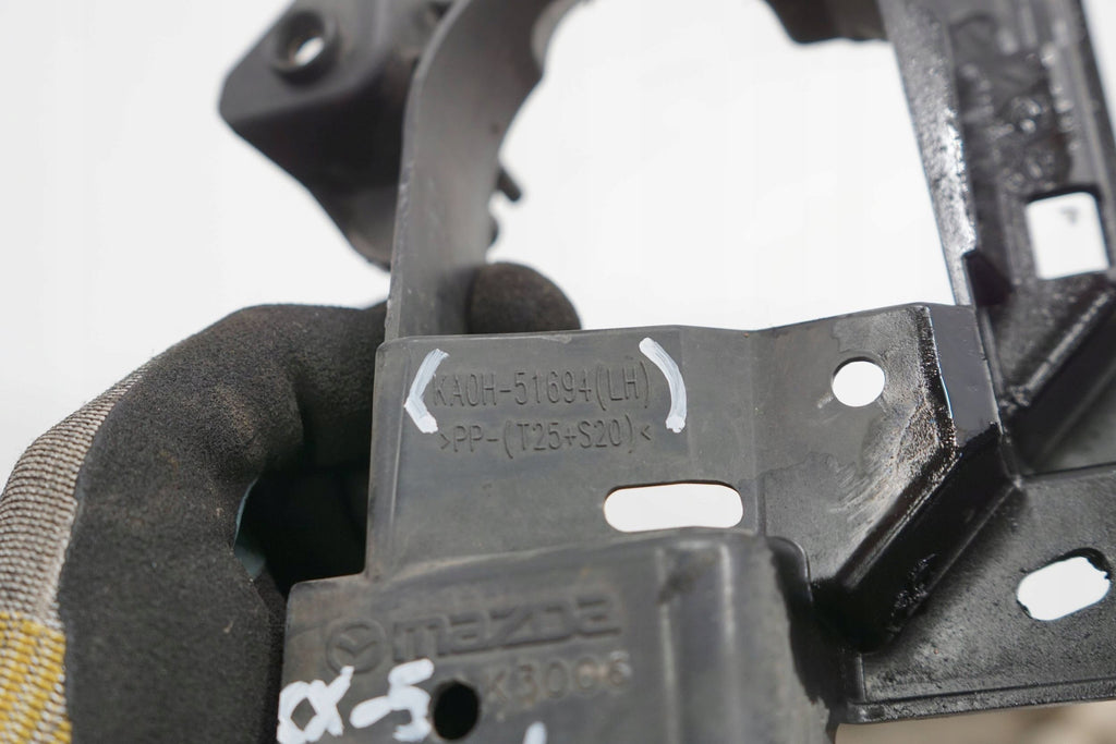 MAZDA CX-5 I LIFT 15R HALOGEN MOUNT BRACKET LEFT FRONT KA0H-51694