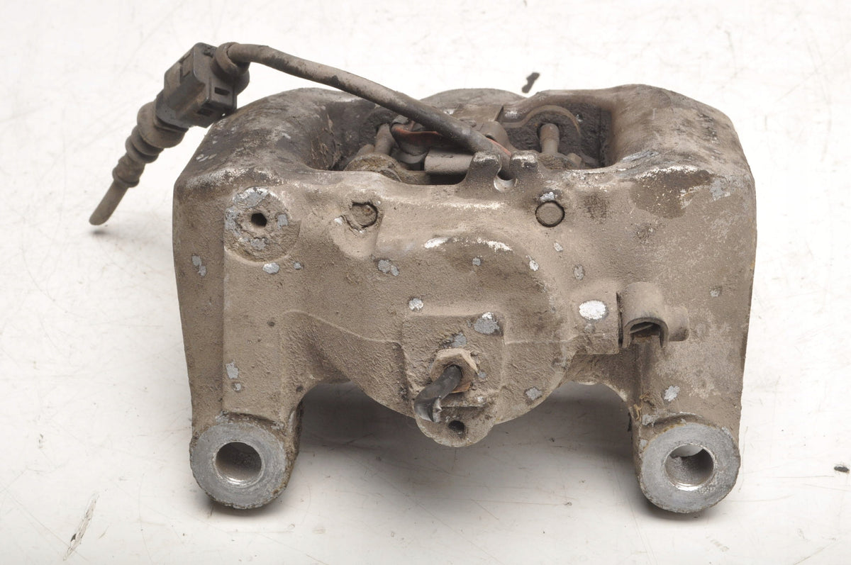 VOLKSWAGEN TOUAREG AND BRAKE CALIPER RIGHT REAR