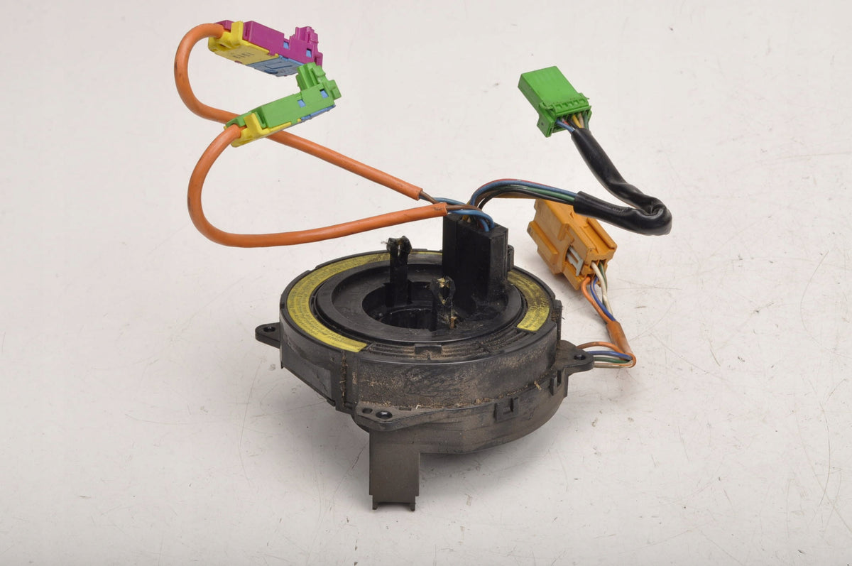 VOLVO S80 AND AIRBAG TAPE RETRACTOR
