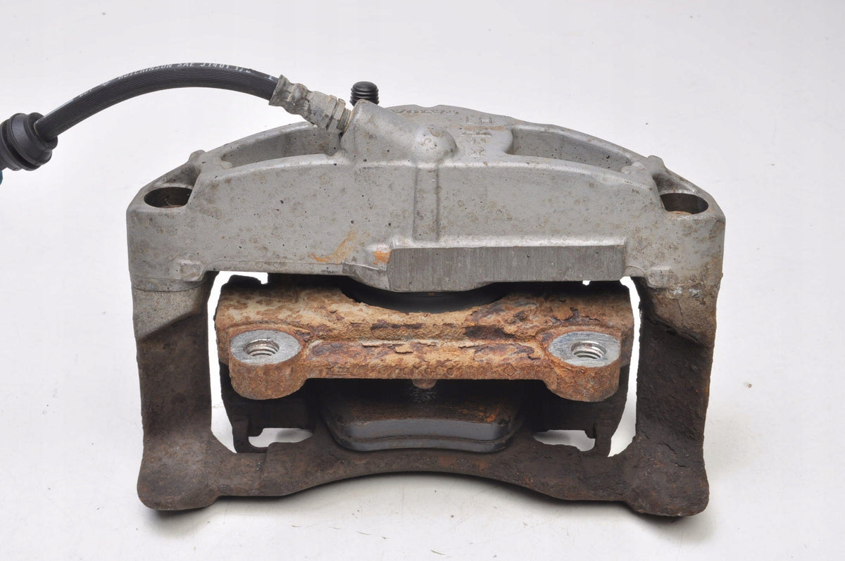 VOLVO XC70 II 2.4 D5 BRAKE CALIPER LEFT FRONT