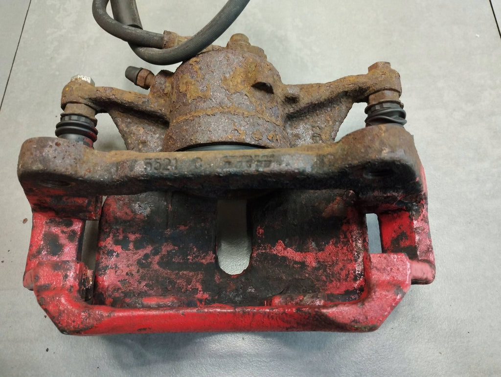 Volkswagen Golf VII Brake caliper left front yoke 8V0615123 8V0615125