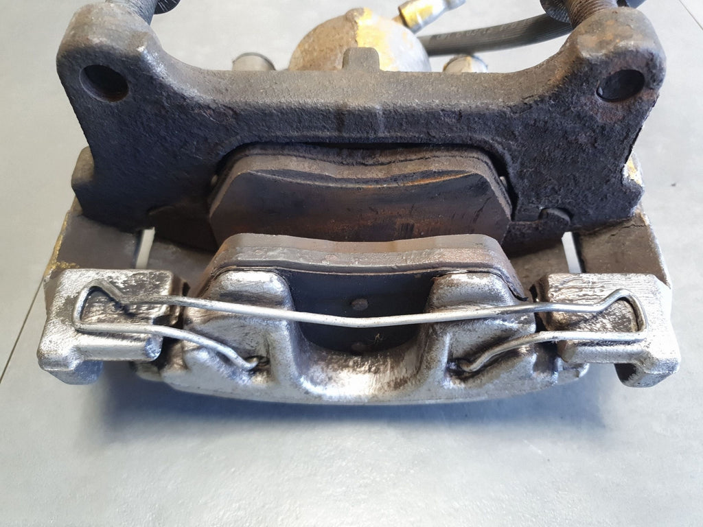 Volkswagen PASSAT CC Brake caliper right front yoke 1K0615124E